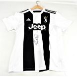 CRISTIANO RONALDO; a signed replica Juventus shirt.