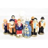 A set of four novelty ceramic salt and pepper shakers modelled after Only Fools and Horses
