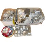 A large group of spare wristwatch and pocket watch movements and parts, etc.