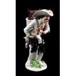 MEISSEN; a mid-18th century figure of a farmer with kid and chicken, height 17.5cm. Provenance: from