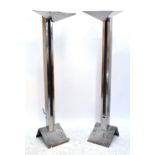 A pair of contemporary metal standard lamps, height 188cm.