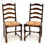 A set of ten oak rush seated ladder back chairs (10).