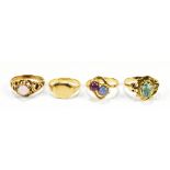 **Amended description** A 9ct yellow gold opal set ring, size J, a yellow metal ruby and sapphire