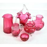 Six pieces of cranberry glass to include twisted handled basket, height 23c, etc (6).