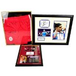 AMIR KHAN; a signature mounted beside two photographs of the boxer, framed, a similar montage for