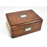 A Victorian burr walnut rectangular sewing box, the cover inlaid with a mother of pearl panel