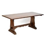 A reproduction oak refectory oak plank top dining table, raised on lyre fall supports, length