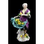 MEISSEN; a mid-18th century figure of a lemon seller from the Cris de Paris series designed by Meyer