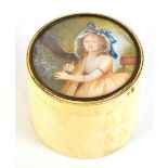 A 19th century ivory circular box, the cover painted with a lady playing the lyre, height 9cm,