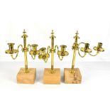 Three pairs of early 19th century brass altar candelabra with turned central column, now mounted