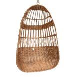 A vintage wicker hanging egg chair.