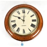 E. WHITE OF LONDON; a 19th century mahogany circular wall clock, the dial set with Roman numerals,