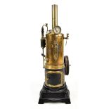 A stationary upright steam engine raised on square section base, height 37cm.
