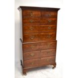 A Victorian mahogany chest on chest, the top section with two short above three long drawers, the