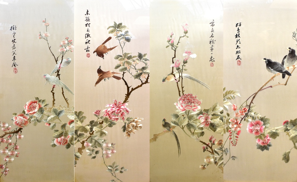 Four 20th century Chinese silks depicting birds in landscapes, each signed, 97 x 33cm, each framed