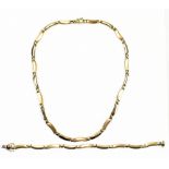 A 9ct yellow gold necklace and matching bracelet, length 42cm and 19cm, combined approx 25.7g.