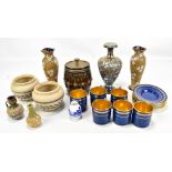A mixed group of ceramics including Wedgwood gilt decorated blue ground coffee cans and saucers