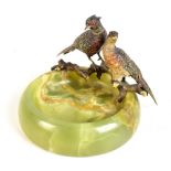 An Art Deco Austrian cold painted bronze and green onyx ashtray decorated with a pair of