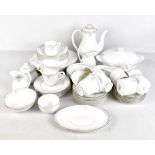 ROYAL DOULTON; an H5084 'Carnation' part dinner service to include trios, bowls, plates, teapot,