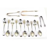 Three pairs of hallmarked silver sugar tongs and a group of ten silver teaspoons, various