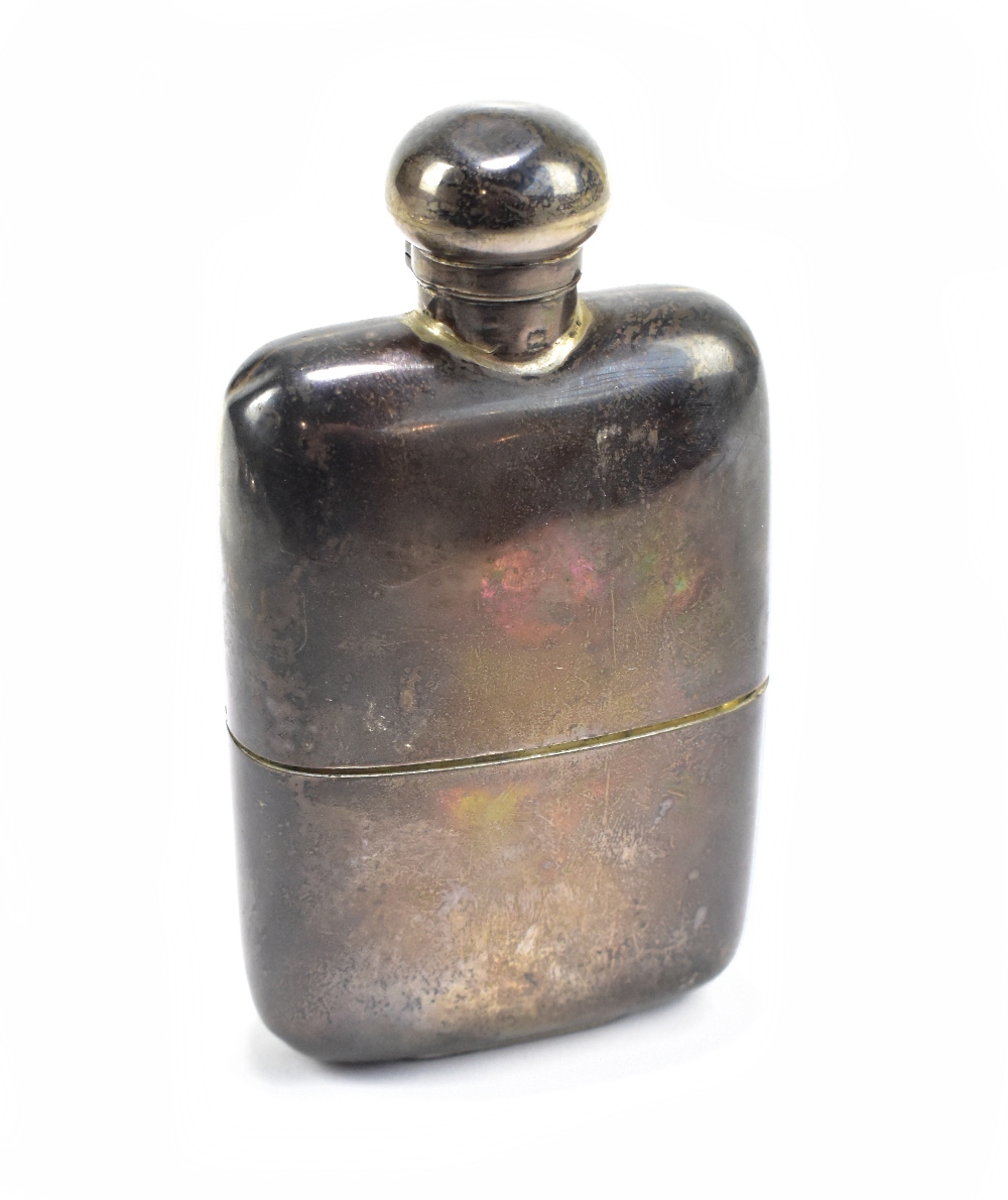 WITHDRAWN An Edwardian hallmarked silver hip flask with detachable cup and twist cap, London 1901,