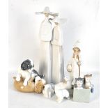 LLADRO; two ceramic figures including a girl holding a staff, also Nao examples of animals (7).