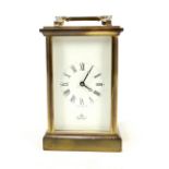 IMPERIAL; a brass cased carriage clock with swing handle, height 17.5cm.Additional