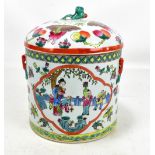 A Chinese ceramic lidded jar decorated with panels of figures in a garden setting between insect and