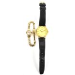 ROTARY; a gentleman's 9ct yellow gold cased wristwatch, the dial set with baton numerals and date