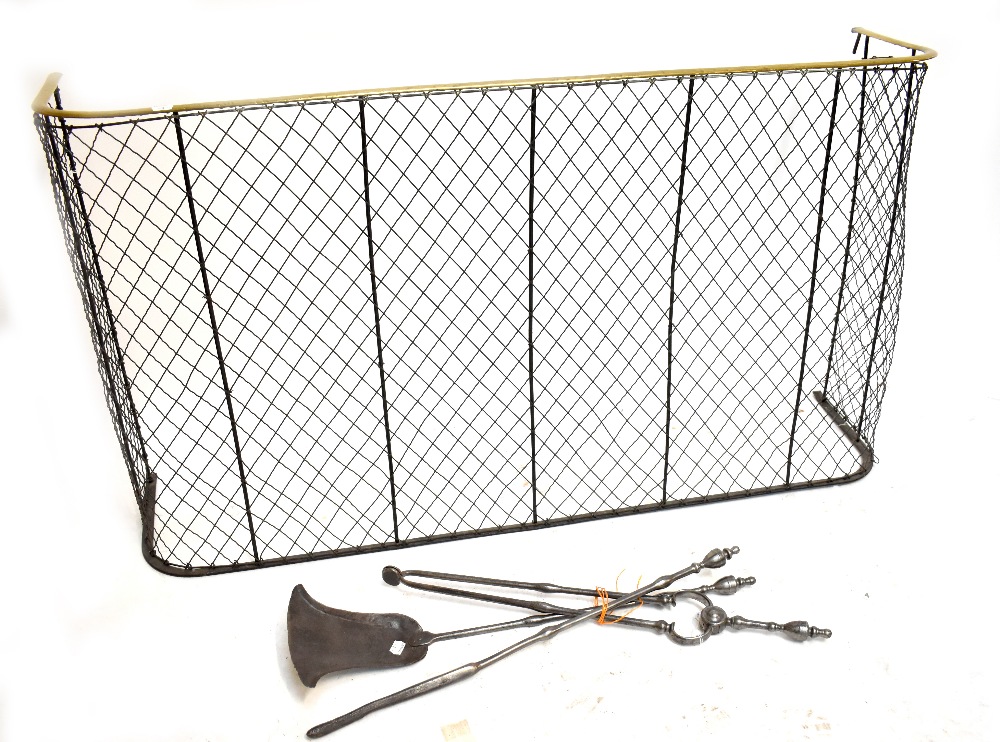 A brass and steel nursery fire screen, width 127cm, and a set of 19th century steel companion