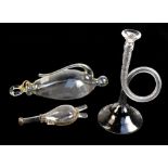 A 19th century French clear glass barometer, a novelty glass horn and a novelty glass flask in the