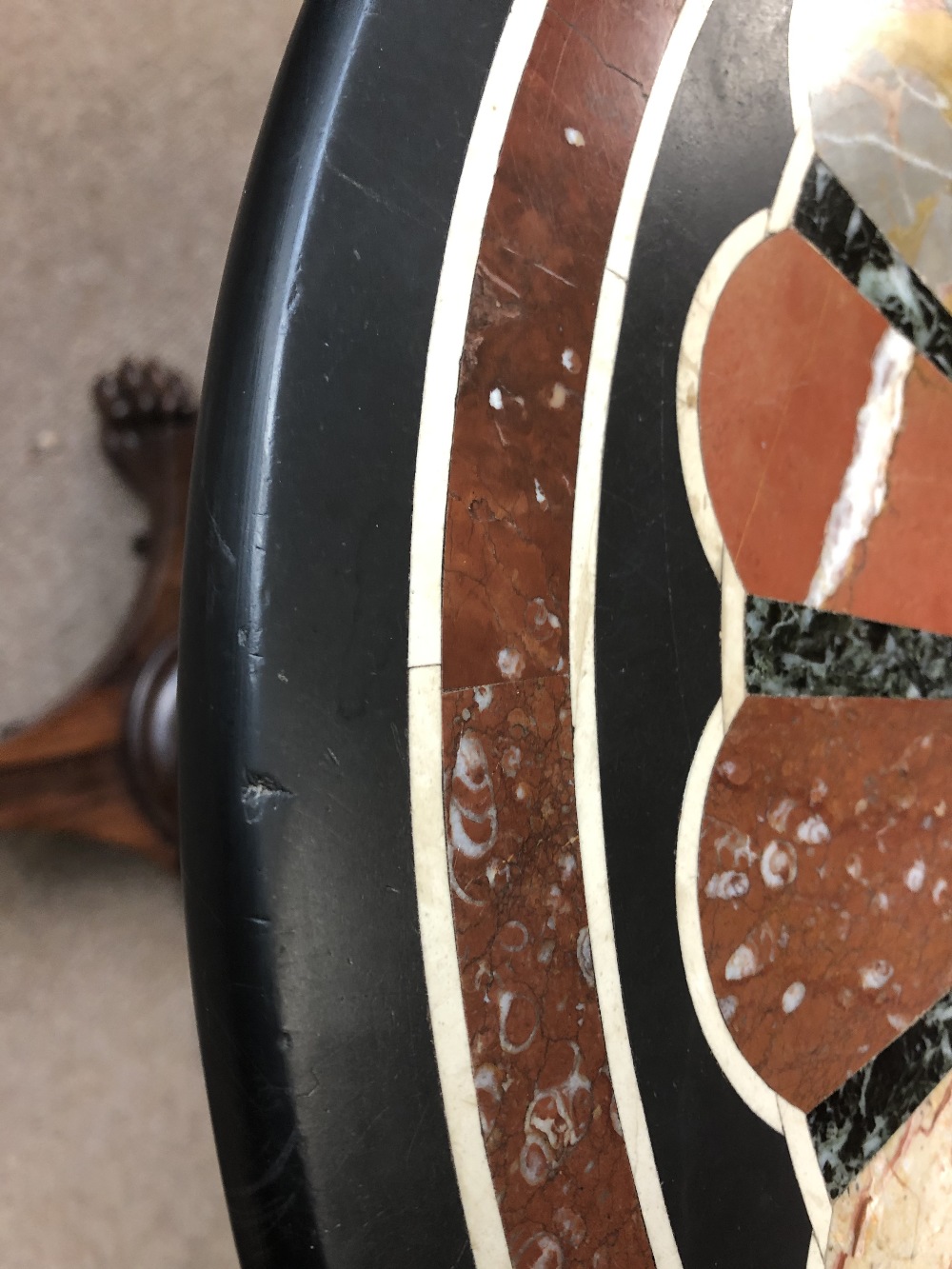 A 19th century circular specimen marble table top with sunburst style decoration, indistinct paper - Bild 2 aus 3