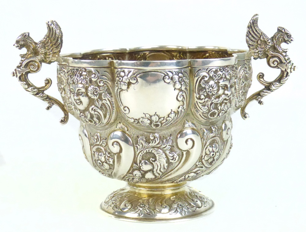 WAKELY & WHEELER; a Victorian hallmarked silver lobed bowl with repoussé figural mask and floral