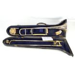 MONARCH; a silver plated trombone with engraved decoration (af), fitted in original carrying case.