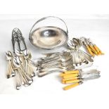 A mixed group of electroplated items, including mixed loose flatware, toast rack, etc.
