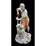 MEISSEN; a mid-18th century figure, 'The Wheelwright', from the Artisan Series modelled by J. J.