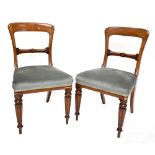 A set of six Victorian oak bar back dining chairs on reeded column supports (6).Additional