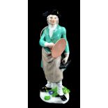 MEISSEN; a mid-18th century figure of a laundry man modelled by P. Reinicke circa 1745, traces of