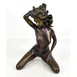 A contemporary bronze figure of a nude female kneeling, unsigned, height 26cm.