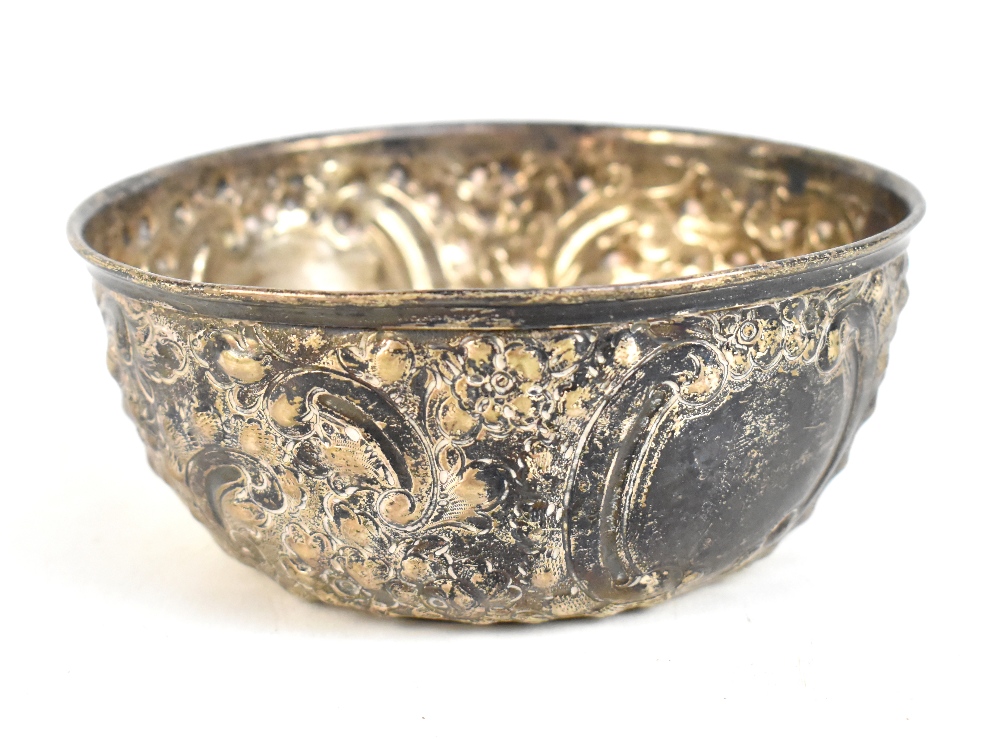 GEORGE NATHAN & RIDLEY HAYES; an Edward VII hallmarked silver bowl with repoussé decoration with two