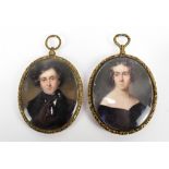 A pair of 19th century portrait miniatures depicting a gentleman and a lady (latter af), both