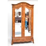 A reproduction French walnut armoire, height 121cm. Additional InformationHas a later hanging rail