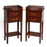 A pair of reproduction two drawer bedside tables, each with gallery top, raised on tapering block