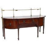A large Regency mahogany and inlaid sideboard with brass curtain rail above single drawer and