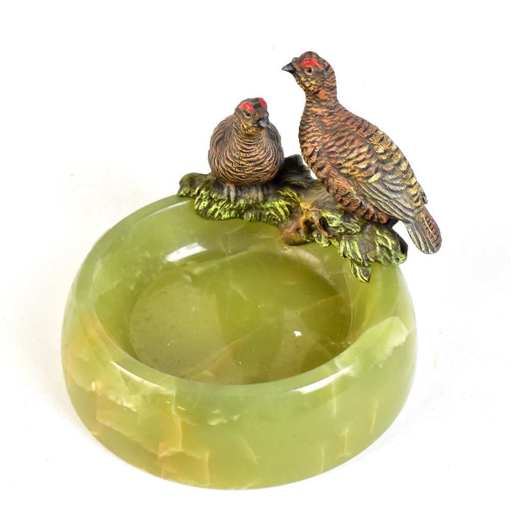 An Art Deco Austrian cold painted bronze and green onyx ashtray decorated with two grouse,