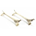 BISHTON'S LTD; a pair of Elizabeth II hallmarked silver pheasant knife rests, length 10cm,