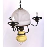 A three branch ceiling light with domed opaque central shade, length 70cm.