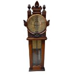 An early 20th century carved oak cased 'Improved Barometer', height 116cm.