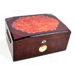 A lacquered humidor, 34 x 24cm.