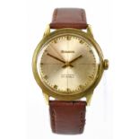 BULOVA; a gentleman's gold plated automatic wristwatch, the silvered dial with batons, diameter